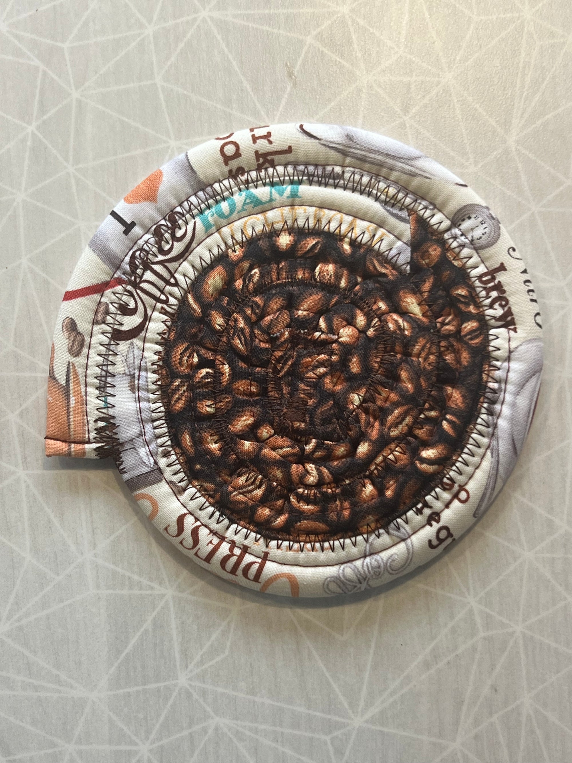 Jellyroll Coaster (coffee beans with coffee words and supplies, multi-colored)