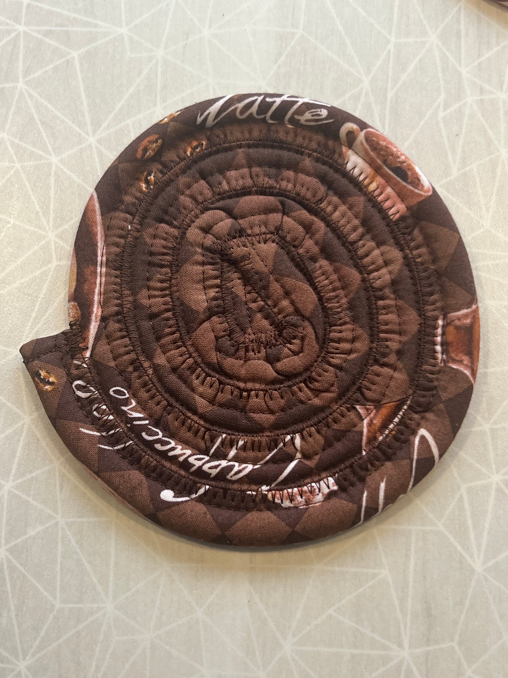 Jellyroll Coaster (brown with coffee cups, coffee words)